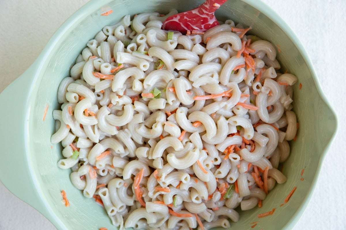 Macaroni salad in a mixing bowl.