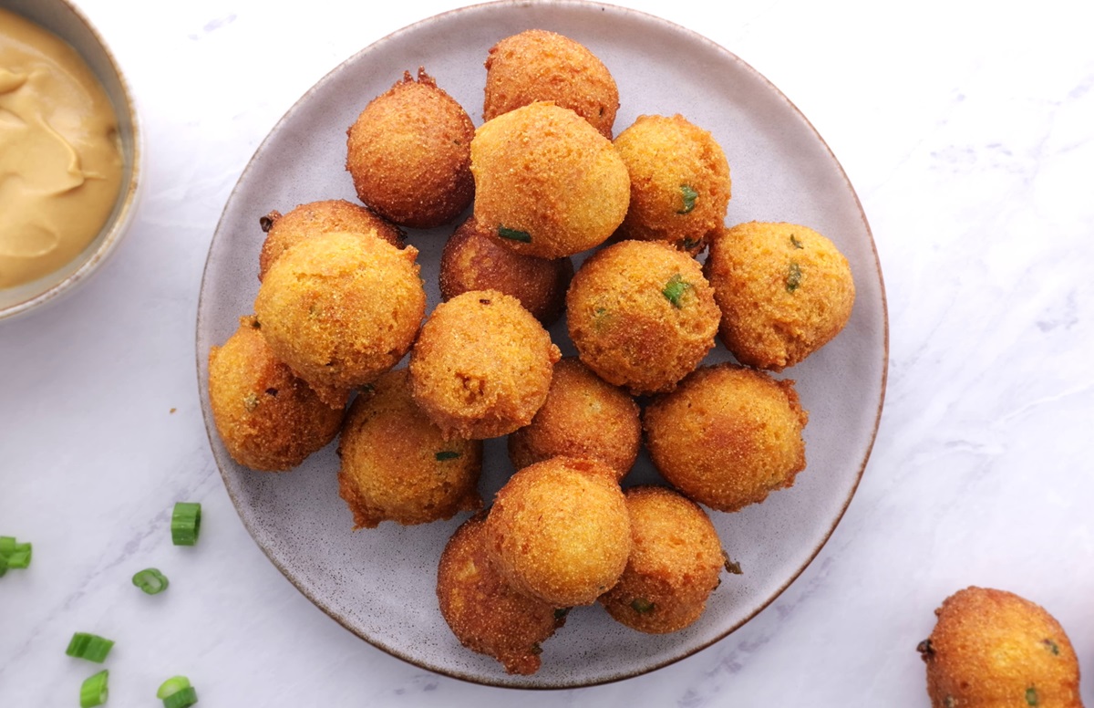 Plate of hush puppies, freshly made and ready to eat