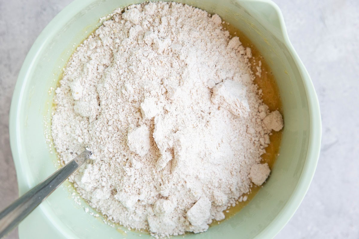 Mixing bowl with wet ingredients and dry ingredients in a mixing bowl.