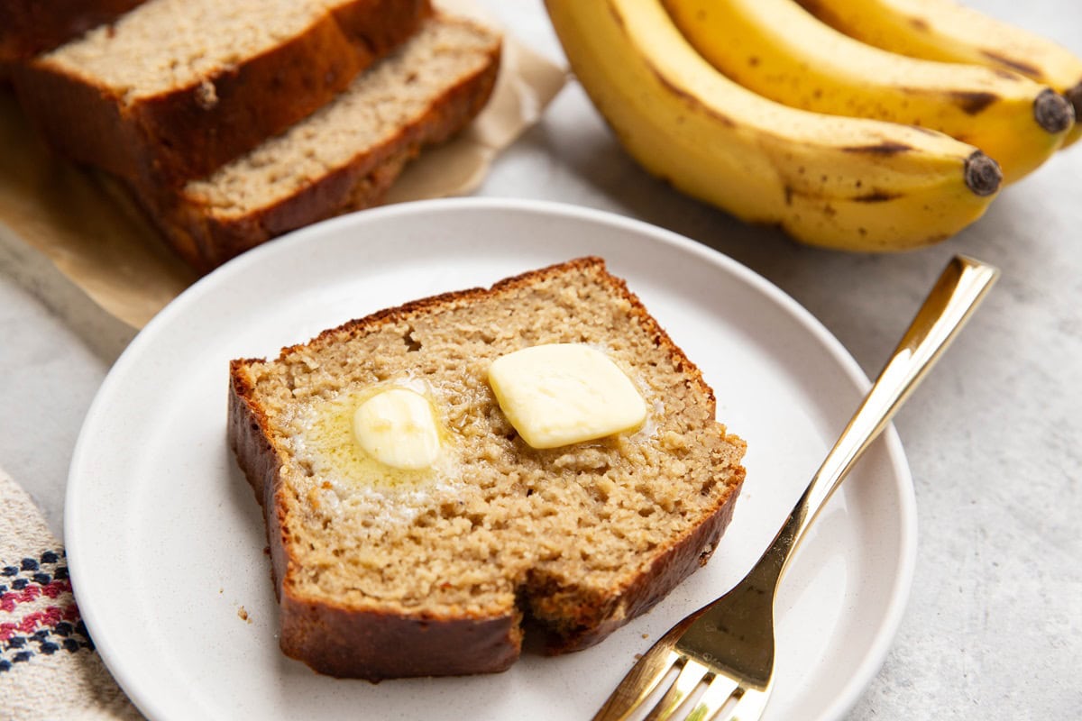 Slice of protein banana bread on a plate.