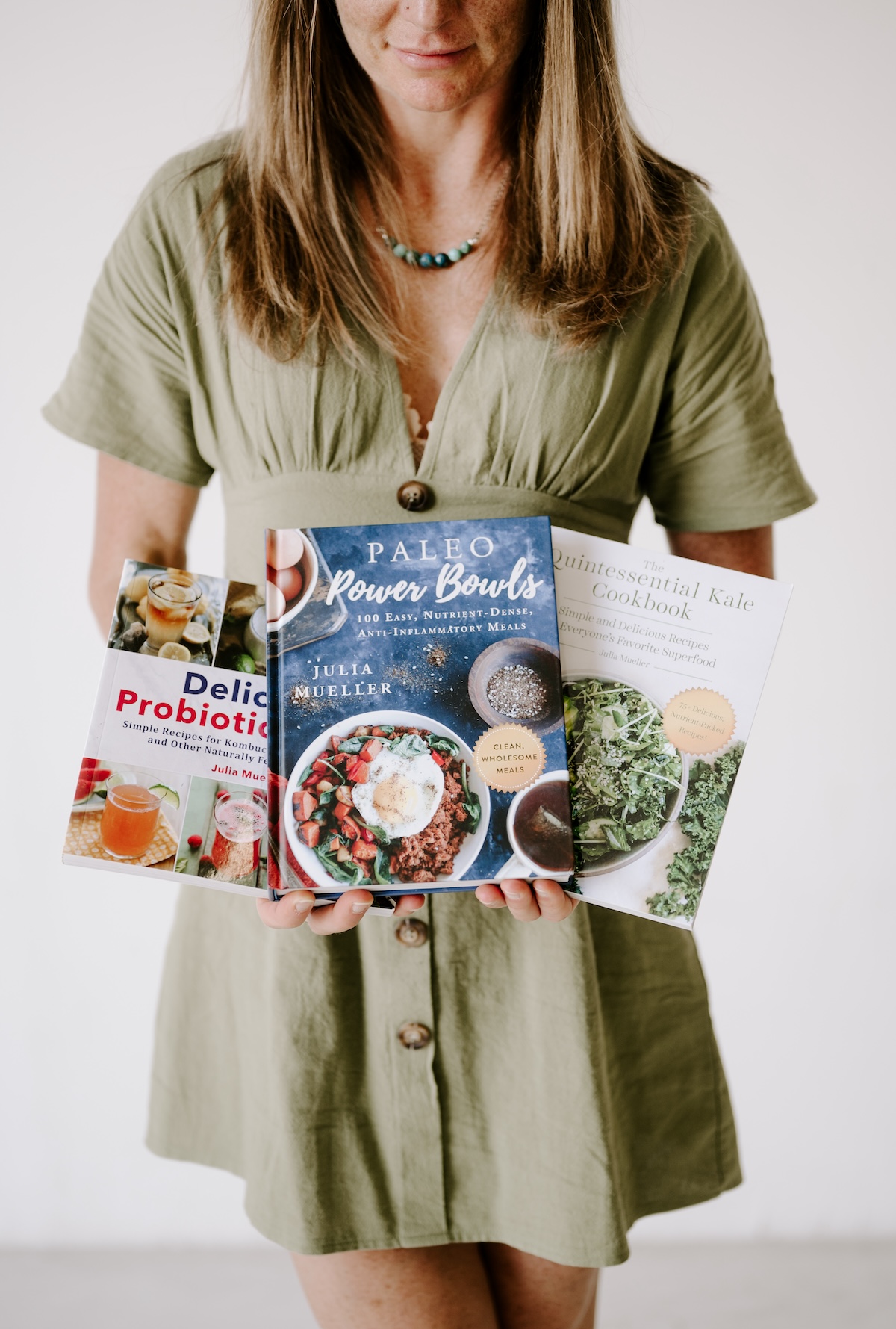 Julia Mueller with her three cookbooks