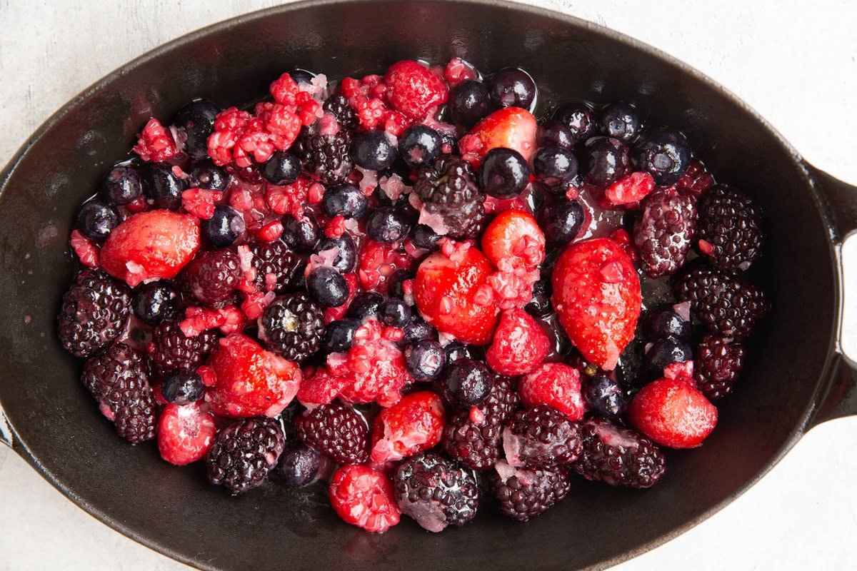 Mixed berry filling in a casserole dish.