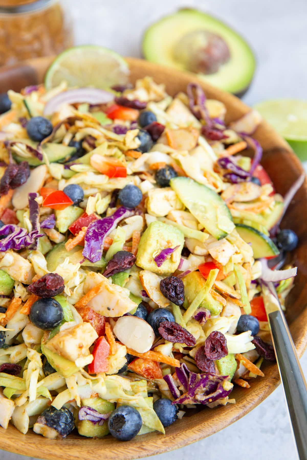 Wooden bowl full of cabbage salad.