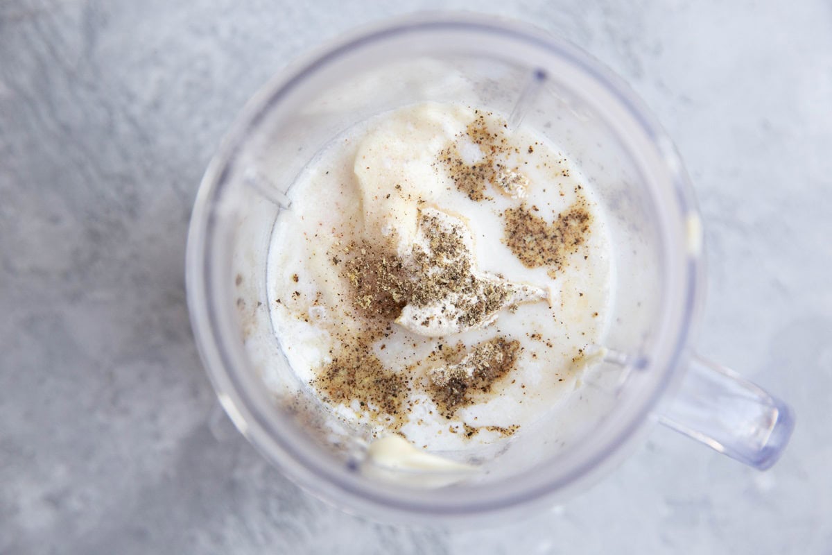 Ingredients for dairy-free ranch dressing in a small blender.