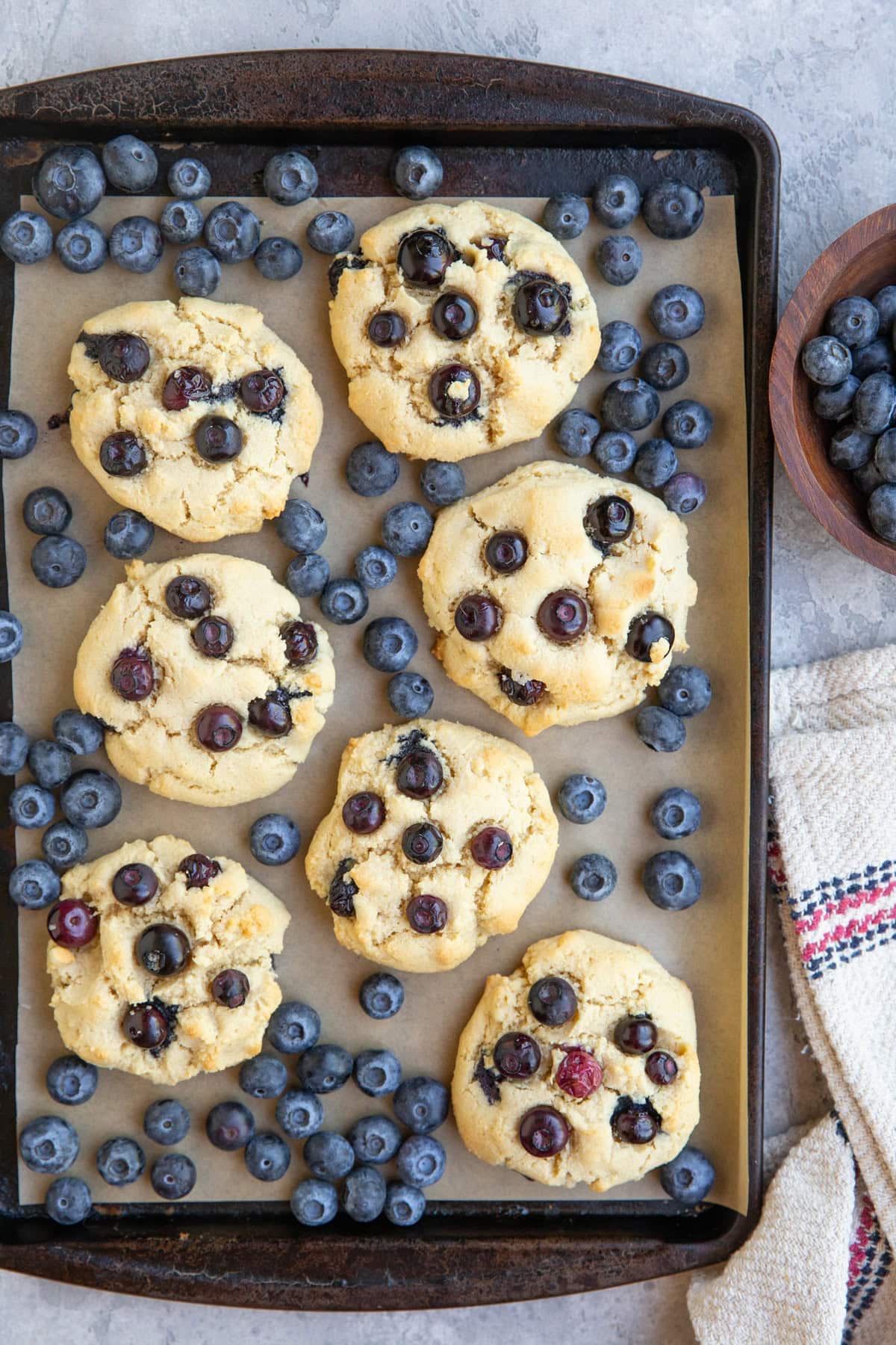 Baking sheet of almond flour blueberry cookies.