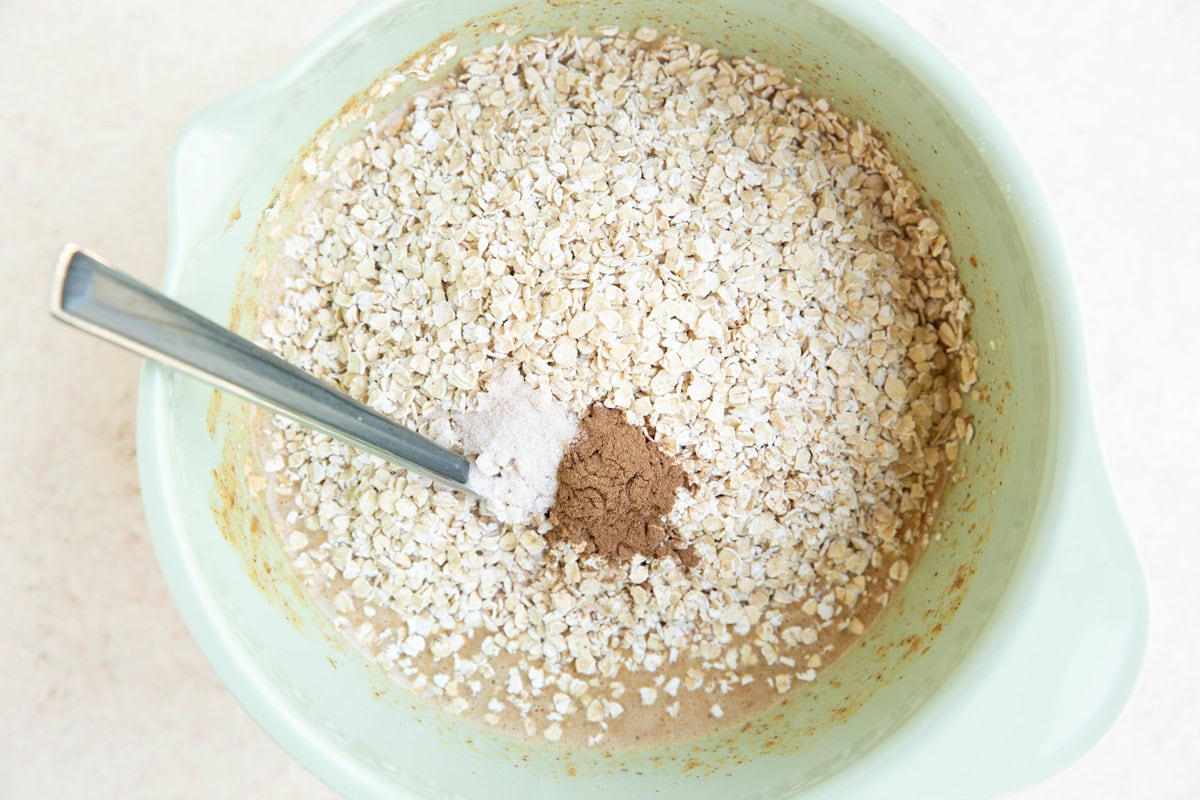 Oats in a mixing bowl ready to be mixed in.