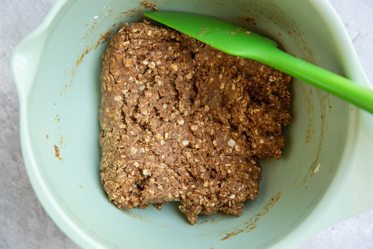 Almond butter layer for almond butter cups mixed up in a mixing bowl.