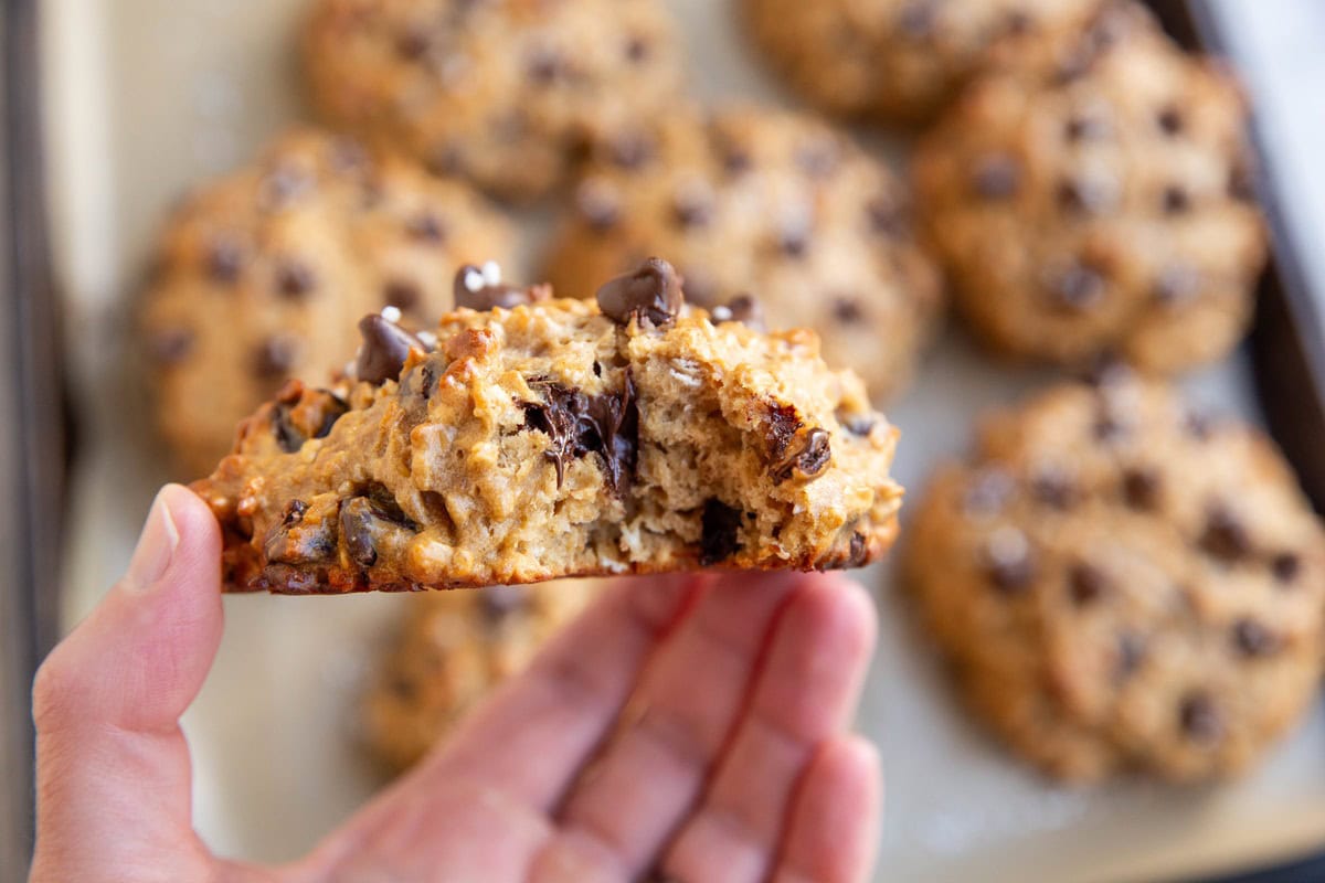 Hand holding a protein cookie.