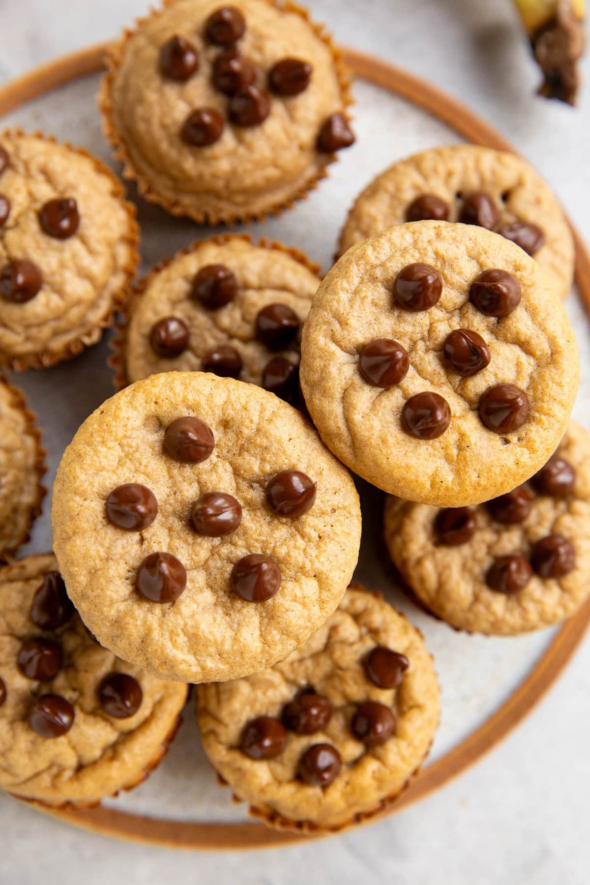 Plate of protein banana muffins with chocolate chips.