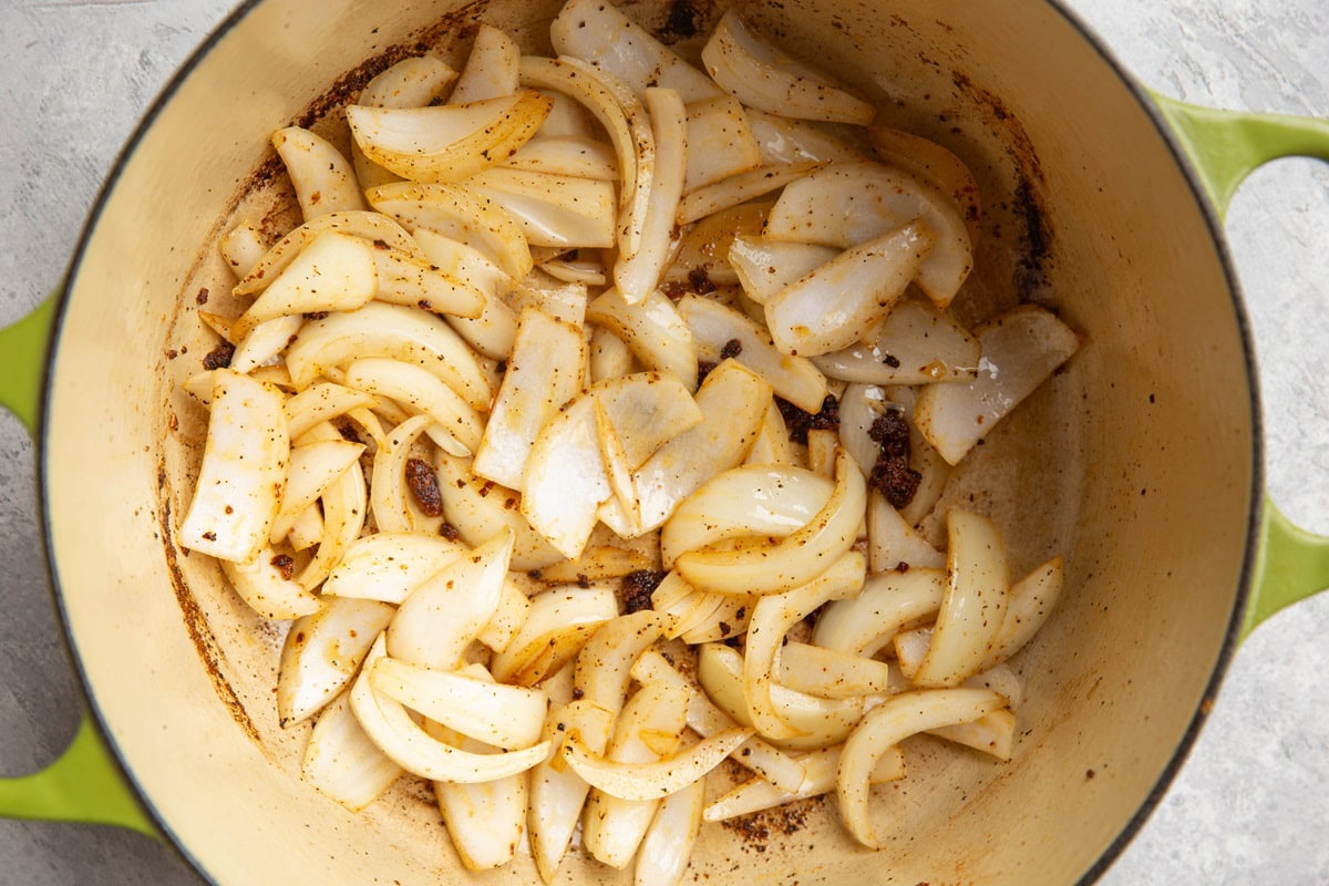 Large pot of onions sauteeing.