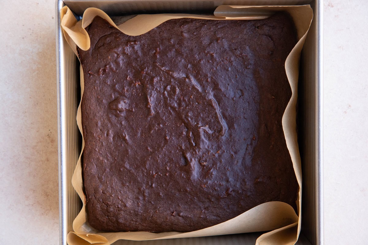 Protein brownies in a baking dish, fresh out of the oven, ready to eat.