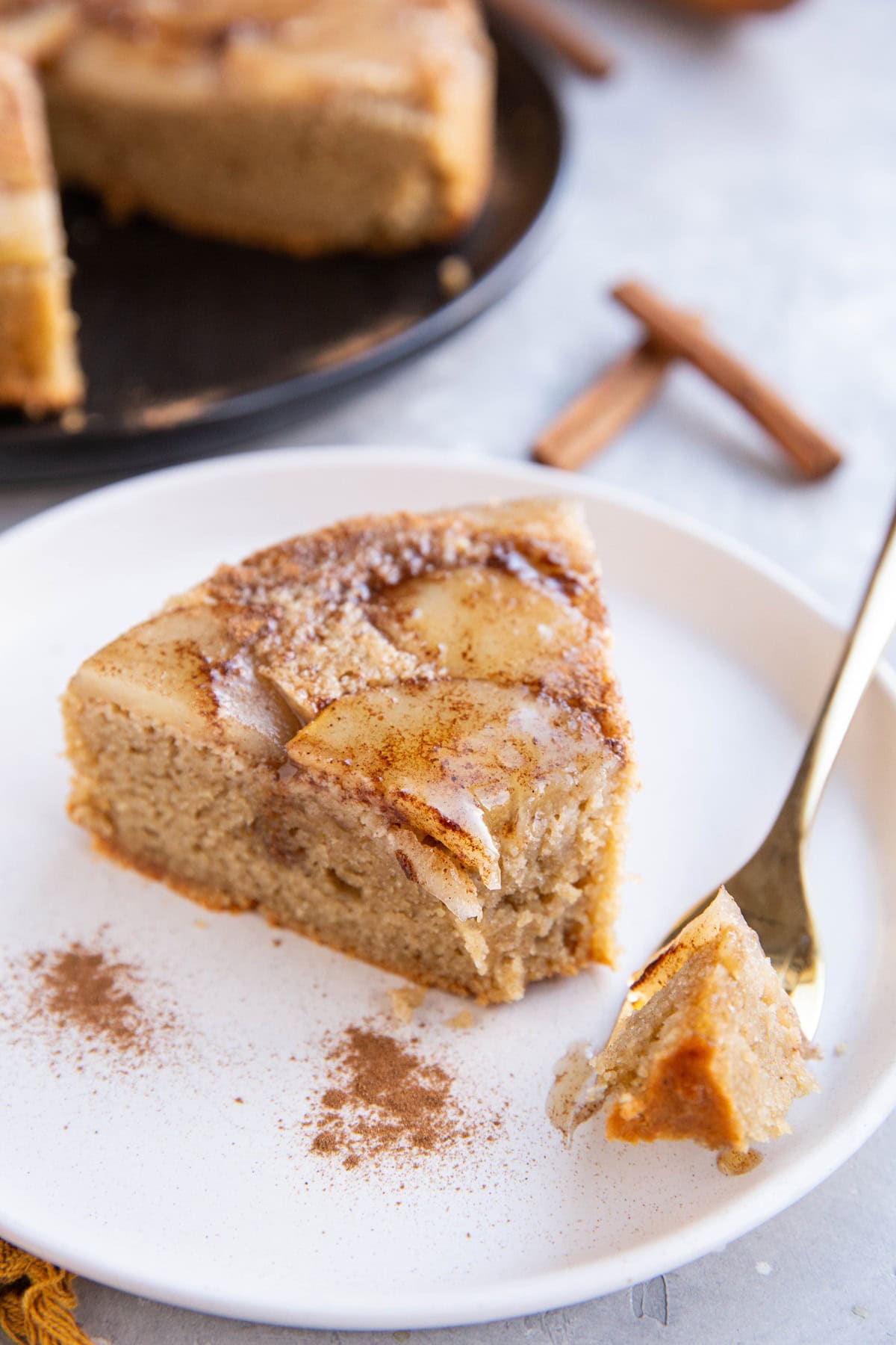 Pear cake with slice taken out.