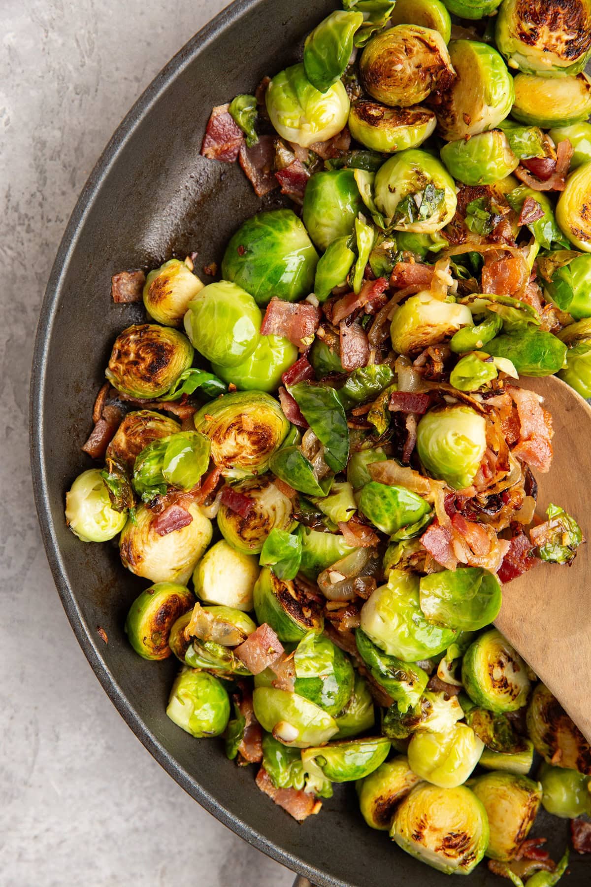 Skillet of brussel sprouts, caramelized onions, and bacon.