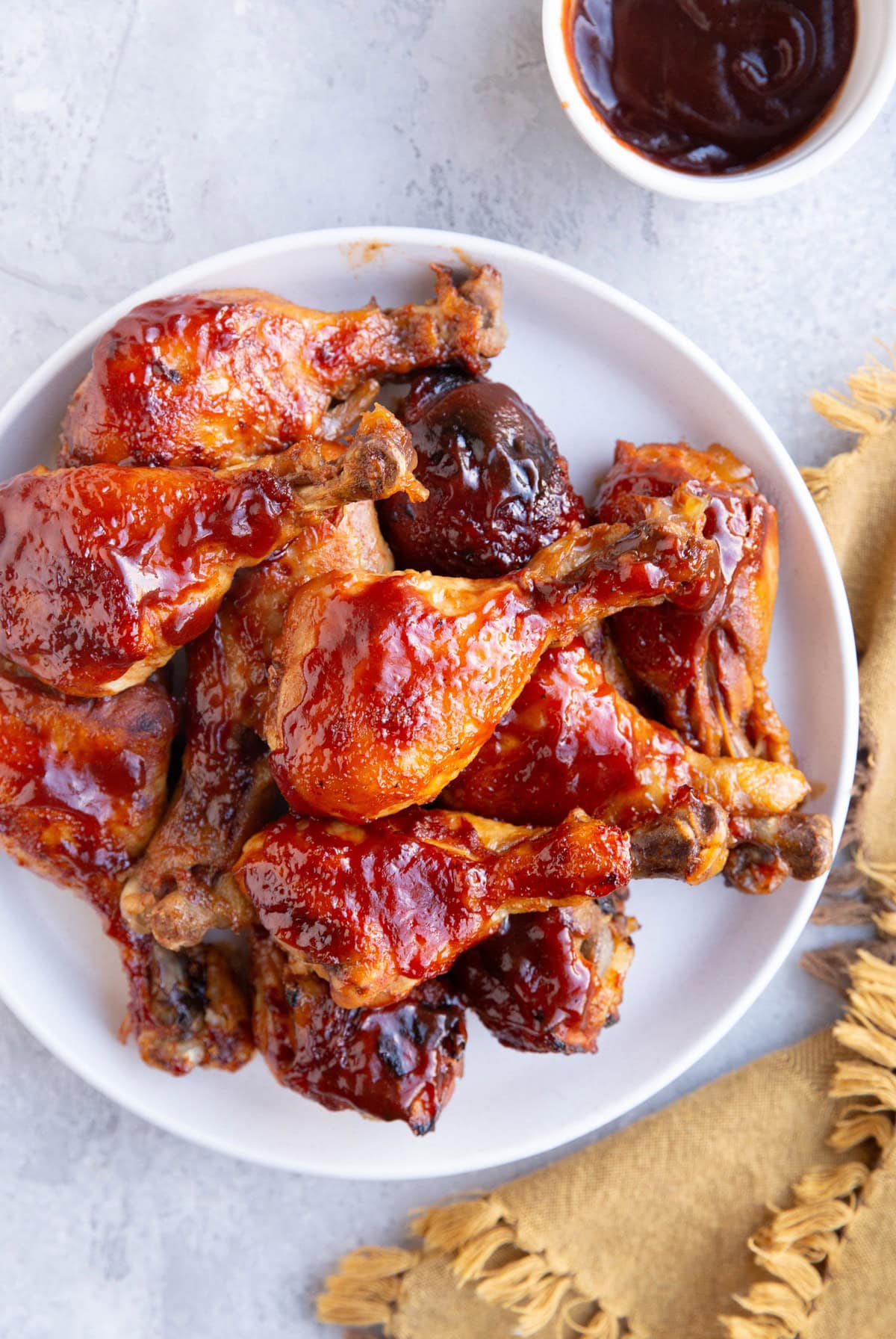 Plate full of bbq chicken.