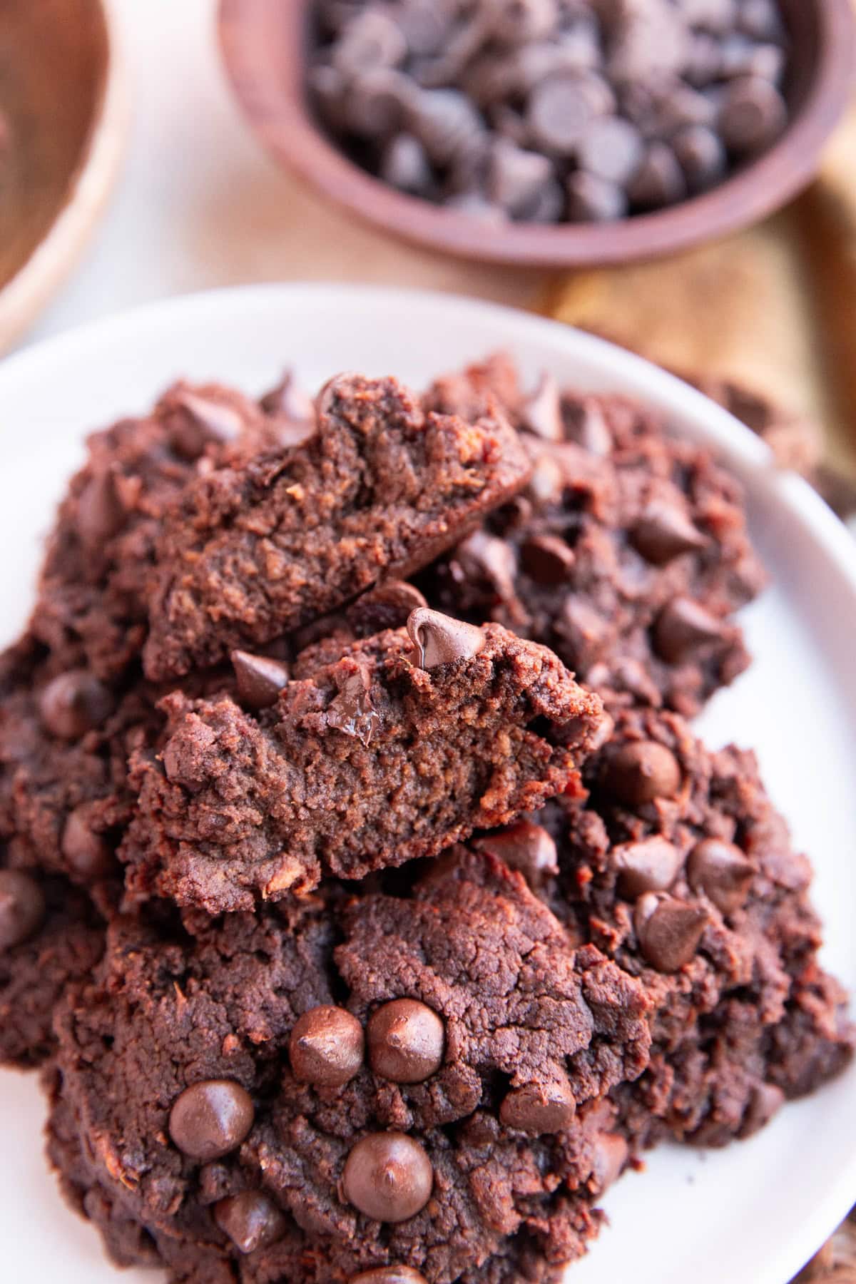 Plate of sweet potato cookies with one cut in half to see the fudgy inside.