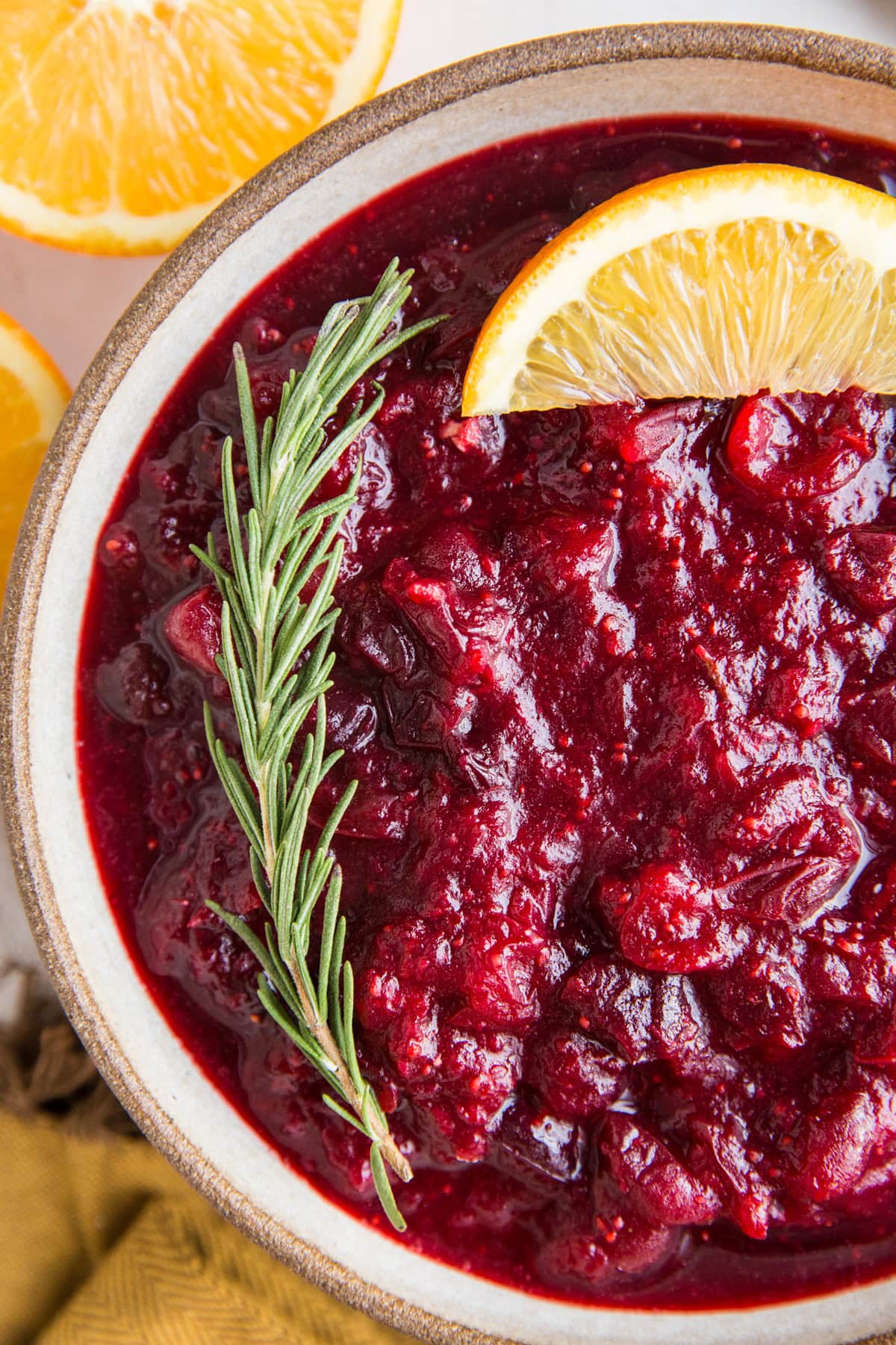 Ginger orange cranberry sauce in a bowl, ready to eat.