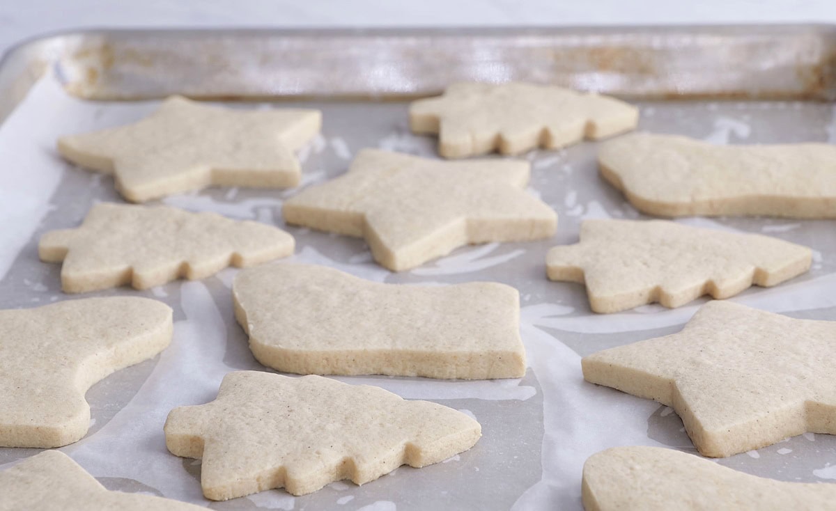 Baking sheet with gluten free sugar cookies fresh out of the oven.