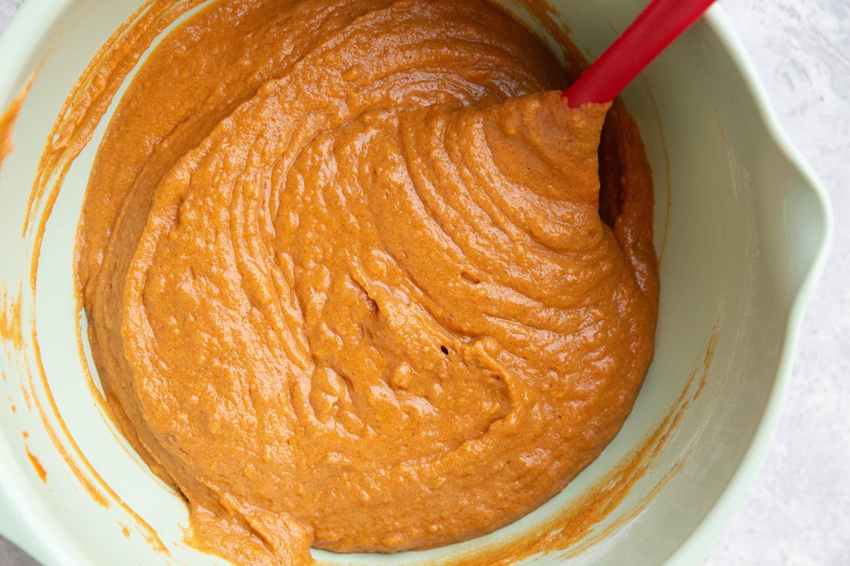 Pumpkin cake batter in a mixing bowl.