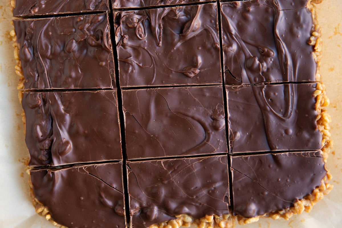 Bars on a cutting board cut into individual slices.