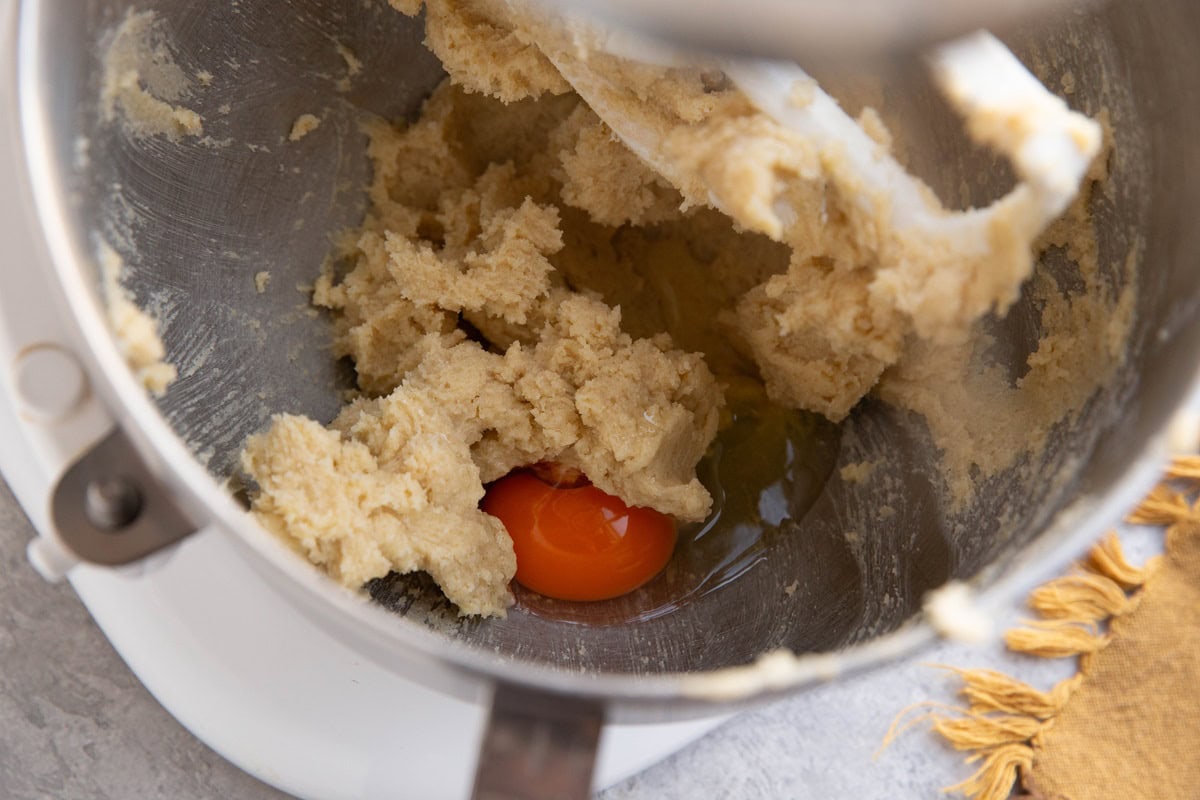 Egg and butter and sugar in a mixer.