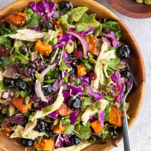 Big wooden bowl of winter salad.