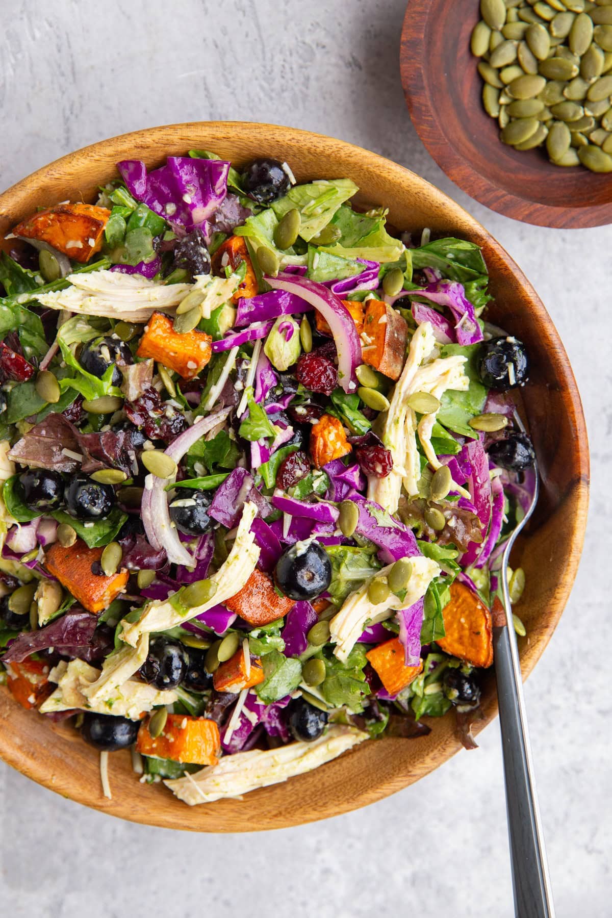 Big wooden bowl of winter salad.