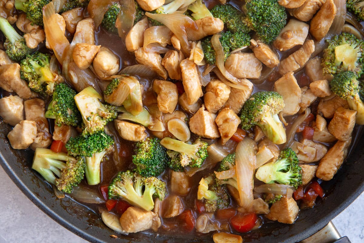 Skillet full of finished broccoli chicken stir fry.