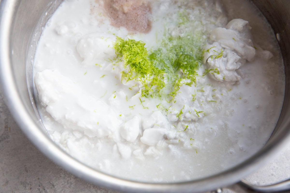 Ingredients for coconut lime rice in a saucepan.