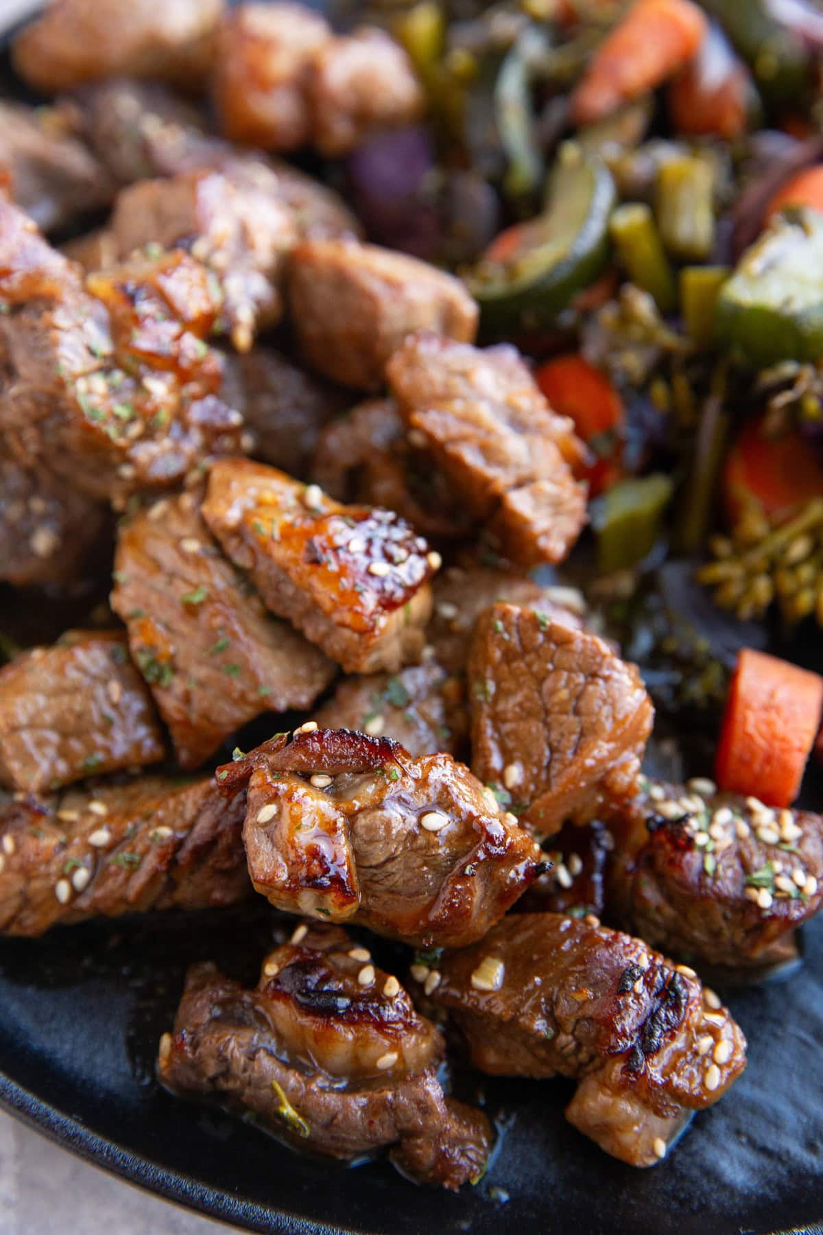 Pile of Garlic Steak Bites on a plate.