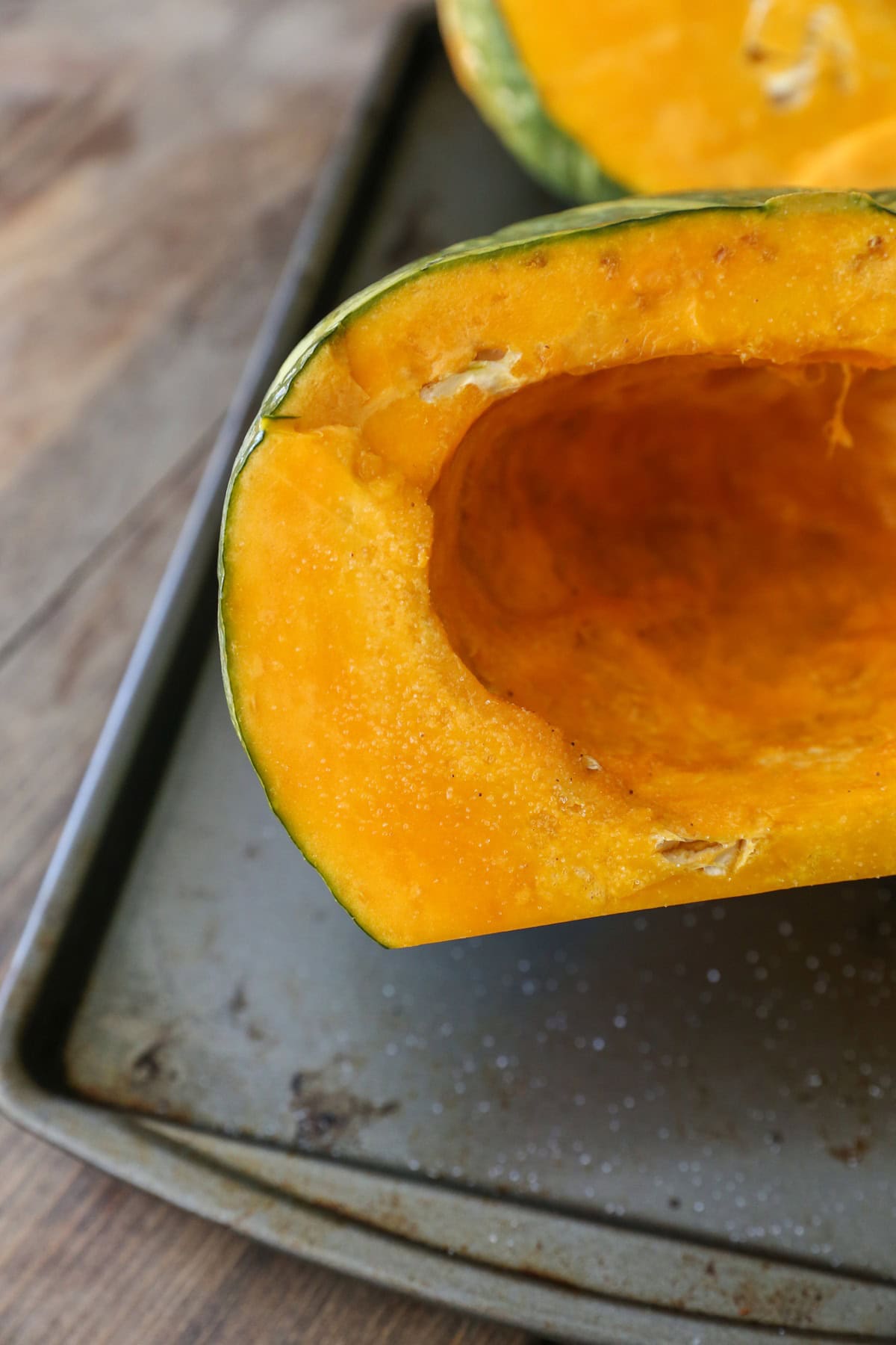 Inside of kabocha squash, drizzled with oil and sea salt.