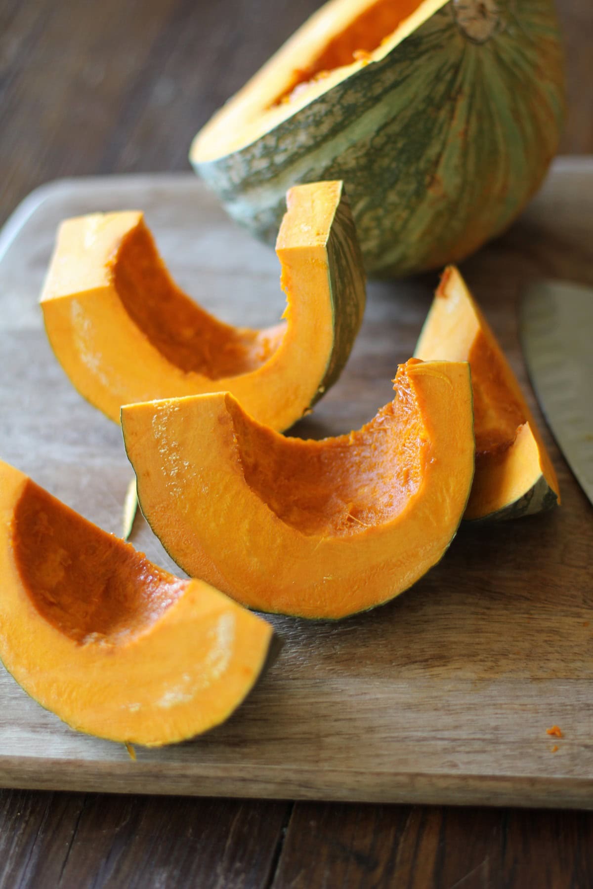 Squash cut into wedges for roasting.