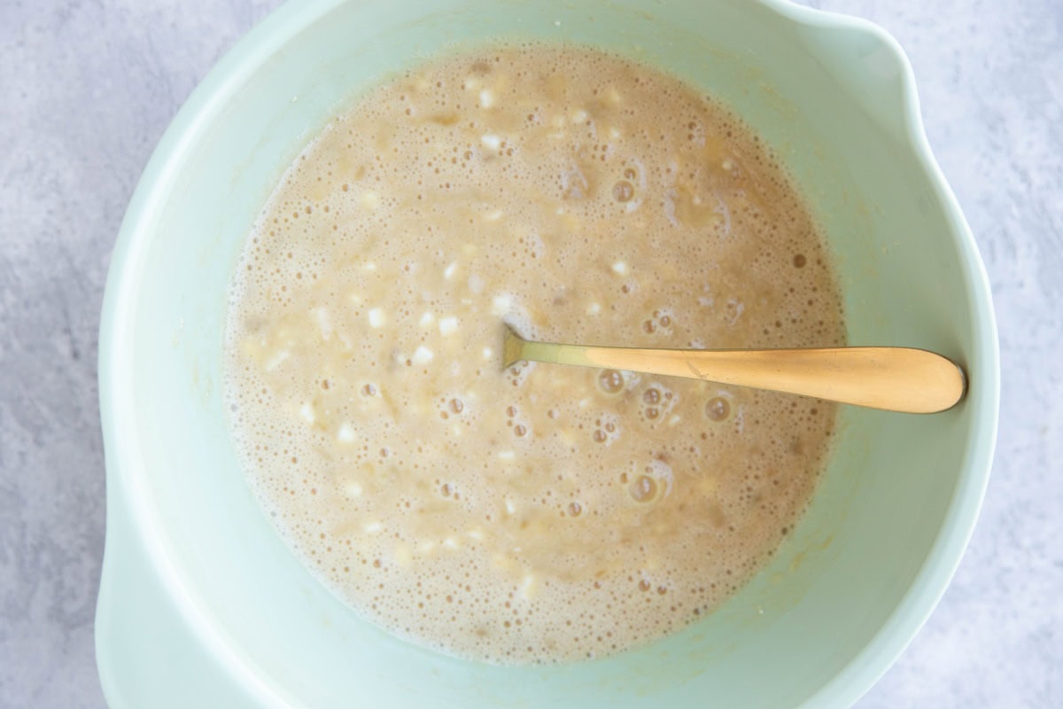 Mixing bowl with wet ingredients for banana cake