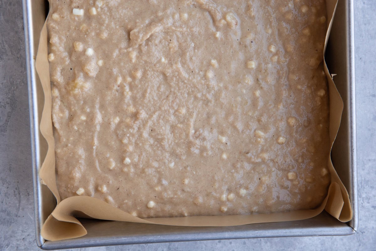 Baking dish full of cake batter, ready to go into the oven.