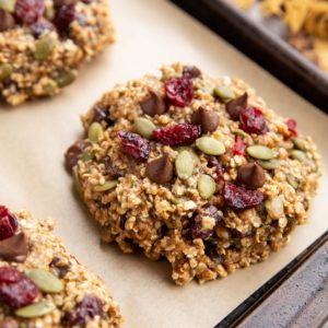 Large cookie with seeds, dried fruit and dried cranberries.