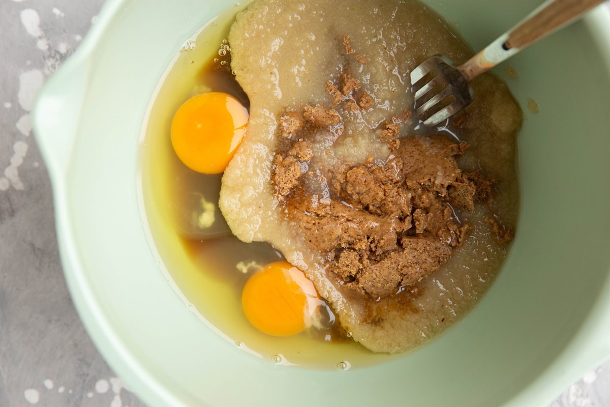 Wet ingredients for breakfast cookies in a mixing bowl.