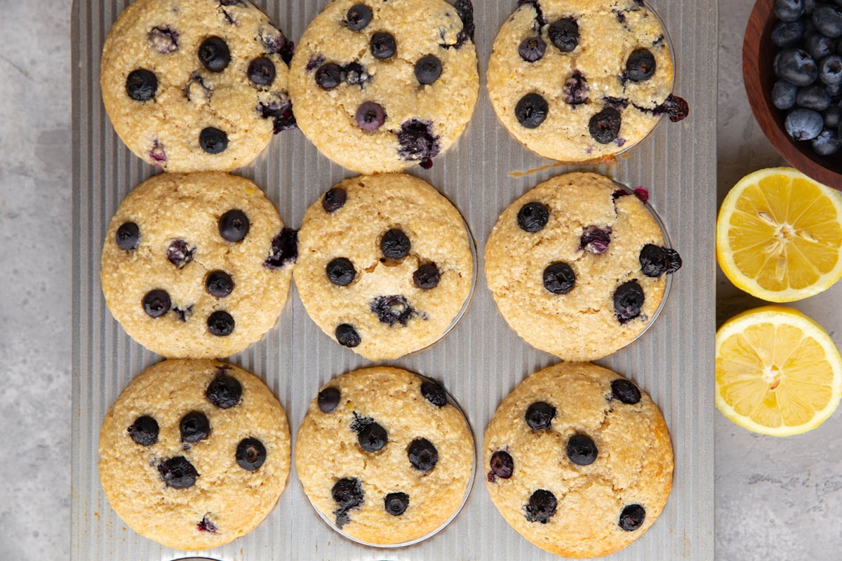 Muffin tray with cottage cheese muffins, fresh out of the oven.