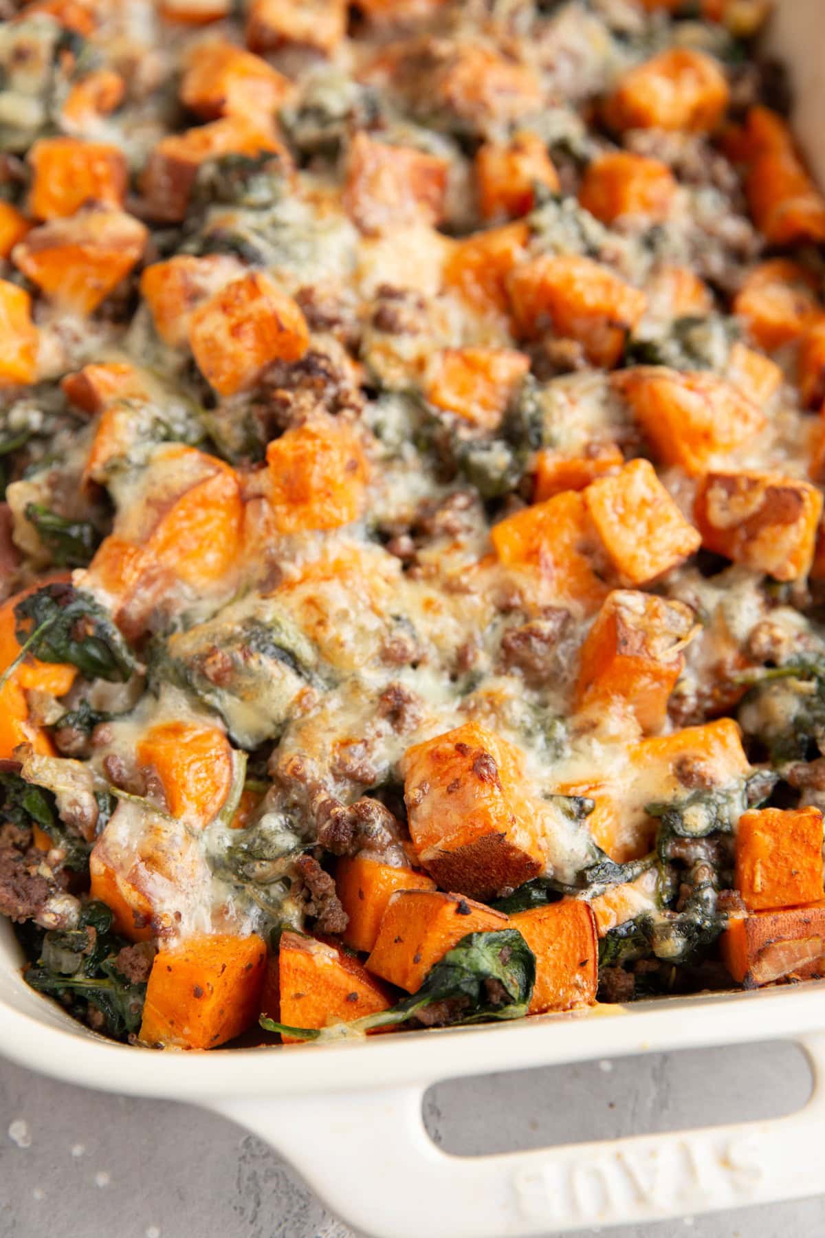 Casserole of sweet potatoes, ground beef, and cheese.